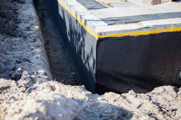 Professional Waterproofing technician working in Osgood, OH
